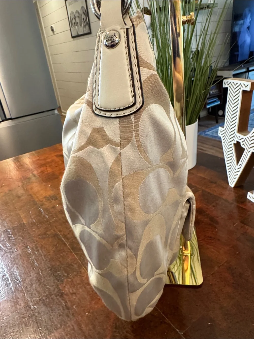 Coach Beige Signature Hobo Bag with Turn-Lock Pocket